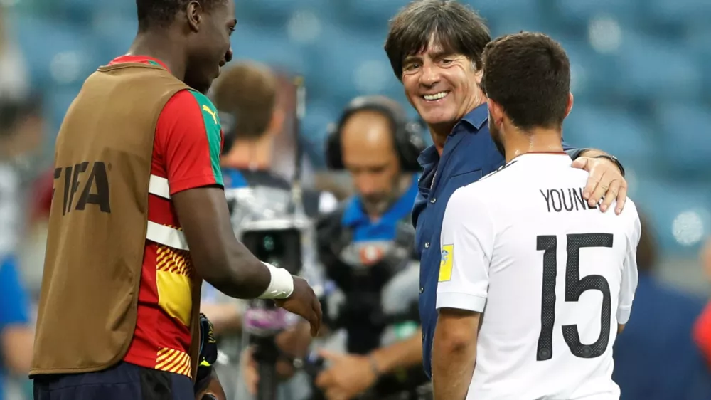 Soccer Football - Germany v Cameroon - FIFA Confederations Cup Russia 2017 - Group B - Fisht Stadium, Sochi, Russia - June 25, 2017  Germany coach Joachim Low and Amin Younes celebrate after the match  REUTERS/Carl Recine