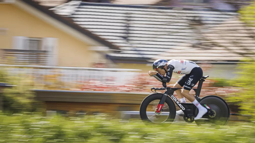 Juan Ayuso from Spain in action during the prologue, a 6,82 km race against the clock, at the 76th Tour de Romandie UCI World Tour Cycling race, in Le Bouveret, Switzerland, Tuesday, April 25, 2023. (Valentin Flauraud/Keystone via AP)