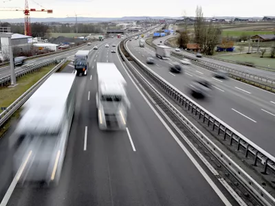 10 December 2021, Baden-Wuerttemberg, Stuttgart: Trucks and cars drive over the Autobahn 8 near Lenfelden-Echterdingen (wiping effect due to long exposure). Photo by: Bernd Wei'brod/picture-alliance/dpa/AP Images