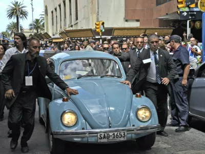 Former Uruguayan president Jose Pepe Mujica inside his Volkswagen 1987 leave the Plaza Independencia, after the inauguration of the new President Tabare Vazquez on March 1, 2015 in Montevideo. Known for his push to legalize cannabis, spartan lifestyle and devotion to his three-legged dog, Uruguay's outspoken President Jose "Pepe" Mujica will step down Sunday more popular than ever.,Image: 221817834, License: Rights-managed, Restrictions:, Model Release: no