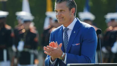 FILE PHOTO: U.S. Defense Secretary Pete Hegseth reacts during a ceremony honoring prisoners of war, at the Pentagon in Washington, D.C. U.S., September 19, 2025. REUTERS/Daniel Becerril/File Photo