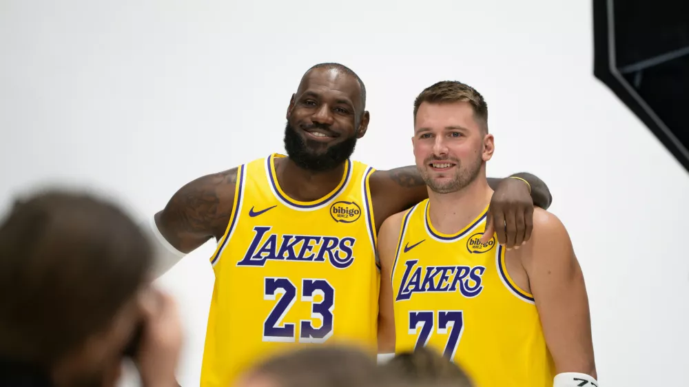 Los Angeles Lakers' LeBron James (23) poses with Luka Doncic (77) during the NBA basketball team's media day in El Segundo, Calif., Monday, Sept. 29, 2025. (AP Photo/Jae C. Hong)