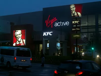 A KFC store is seen next door to a Virgin Active gym in Hillcrest, South Africa September 28, 2017. REUTERS/Rogan Ward