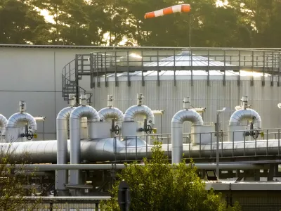FILE - Morning light falls on the landfall facility of the Nord Stream 1 Baltic Sea pipeline and the transfer station of the OPAL gas pipeline, the Baltic Sea Pipeline Link, in Lubmin, Germany, July 21, 2022. A series of unusual leaks on two natural gas pipelines running from Russia under the Baltic Sea to Germany have triggered concerns about possible sabotage. It's overshadowed the inauguration Tuesday Sept. 27, 2022, of a long-awaited pipeline that will bring Norwegian gas to Poland. (AP Photo/Markus Schreiber, File)