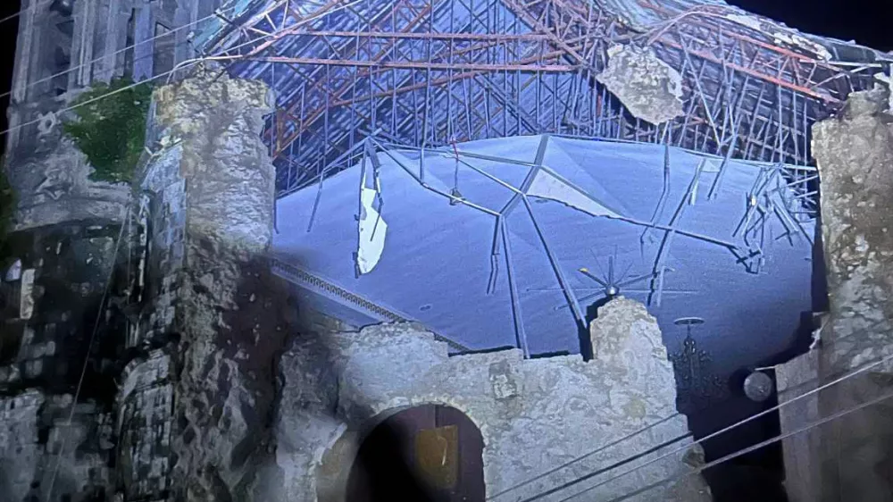 Damage outside the Archdiocesan Shrine of Santa Rosa de Lima in Cebu City is shown on Tuesday, Sept. 30, 2025, after strong offshore earthquake with a preliminary magnitude of 6.9 shook the central Philippines. (Vince Sylvan A. Toring via AP)