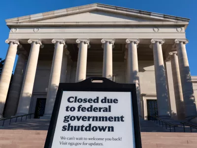 A sign that reads "Closed due to federal government shutdown," is seen outside of the National Gallery of Art on the 6th day of the government shutdown, in Washington, Monday, Oct. 6, 2025. (AP Photo/Jose Luis Magana)