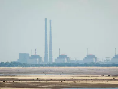 FILE PHOTO: A view shows Zaporizhzhia Nuclear Power Plant from the bank of Kakhovka Reservoir near the town of Nikopol after the Nova Kakhovka dam breached, amid Russia's attack on Ukraine, in Dnipropetrovsk region, Ukraine June 16, 2023. REUTERS/Alina Smutko/File Photo
