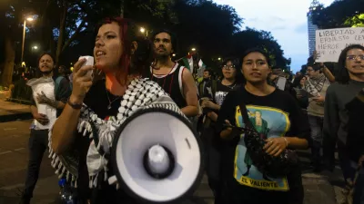 Pro-Palestinian demonstrators march during a rally in solidarity with the Global Sumud Flotilla and Gaza, in Mexico City, Mexico, October 1, 2025. REUTERS/Quetzalli Nicte-Ha