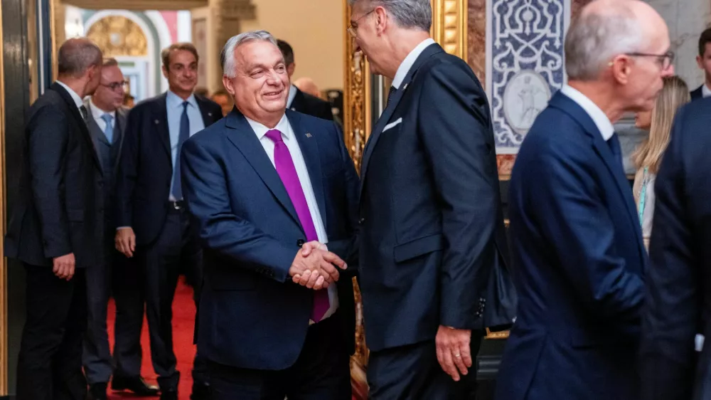 Hungary's Prime Minister, Viktor Orban, shakes hands with Croatia's Prime Minister, Andrej Plenkovic, at an informal summit in the Danish parliament at Christiansborg Castle in Copenhagen, Denmark, October 1, 2025. Ritzau Scanpix/Ida Marie Odgaard via REUTERS  ATTENTION EDITORS - THIS IMAGE WAS PROVIDED BY A THIRD PARTY. DENMARK OUT. NO COMMERCIAL OR EDITORIAL SALES IN DENMARK.
