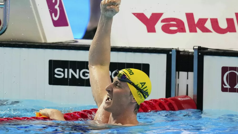 Cameron McEvoy of Australia celebrates after winning gold medal in the men's 50-meter freestyle final at the World Aquatics Championships in Singapore, Saturday, Aug. 2, 2025. (AP Photo/Vincent Thian)