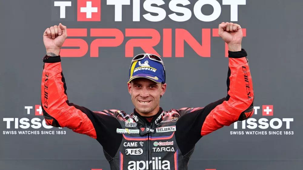 MotoGP - Indonesian Grand Prix - Mandalika International Street Circuit, Mandalika, Indonesia - October 4, 2025 Aprilia Racing's Marco Bezzecchi celebrates after winning the sprint race REUTERS/Willy Kurniawan