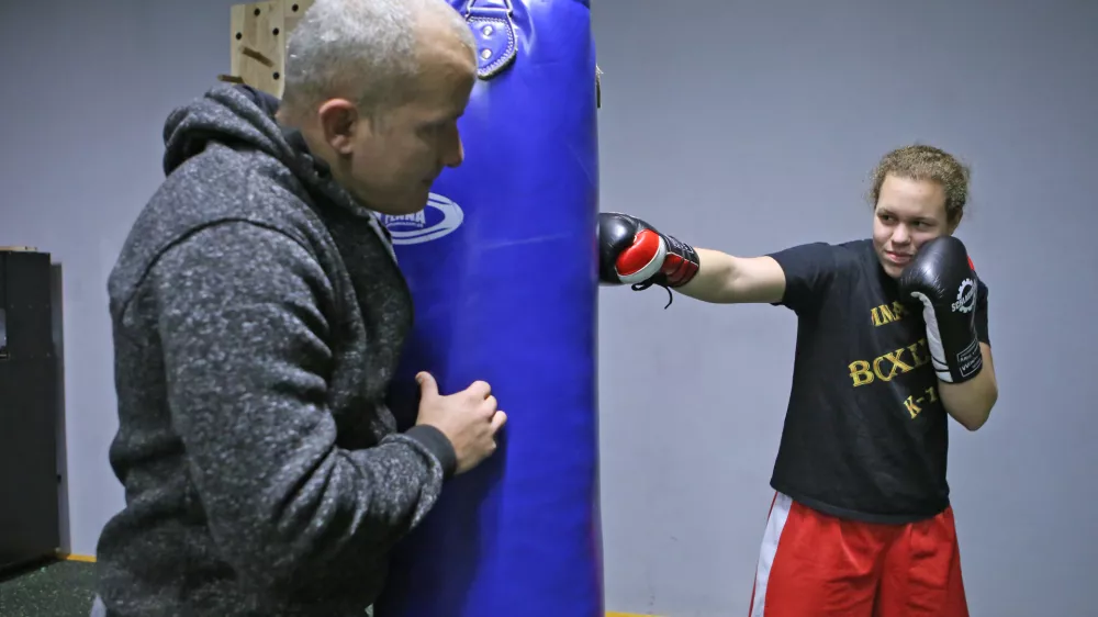 - 20.11.2017 - boksarski trener Rudi Pavlin in najbolj&scaron;a slovenska boksarka Ema Kozin, ki si je po naslovu svetovne prvakinje srednje kategorije po verziji WBU priborila &scaron;e naslova po verzijah WBC in WBF. //FOTO: Tomaž Skale