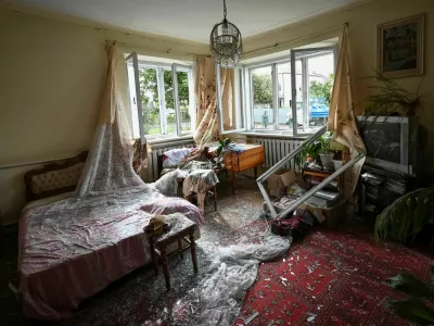 Shattered glass on the floor inside a room of a house damaged during a Russian drone and missile strike, amid Russia's attack on Ukraine, in the village of Lapaivka on the outskirts of Lviv, Ukraine October 5, 2025. REUTERS/Stringer
