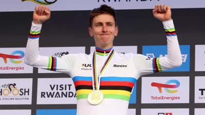 Cycling - Road World Championships 2025 - Kigali, Rwanda - September 28, 2025 Slovenia's Tadej Pogacar celebrates on the podium after winning the Men's Elite Road Race REUTERS/Jean Bizimana