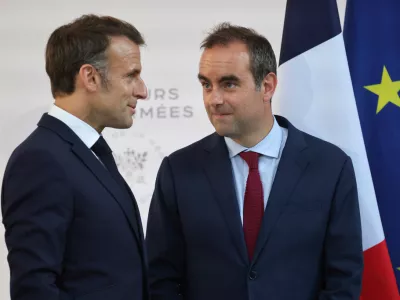 FILE - Then French Defense minister Sebastien Lecornu, right, and France's President Emmanuel Macron talk at the end of an address by the president to army leaders in Paris Sunday July 13, 2025, (Ludovic Marin, Pool via AP, File)