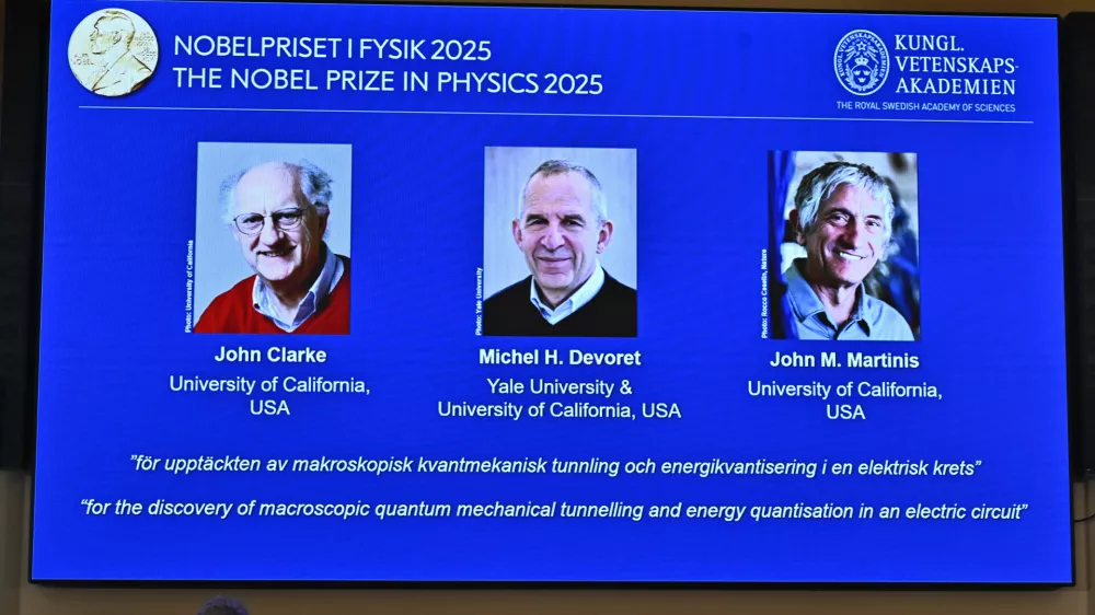 Photos of John Clarke, Michel H Devoret and John M. Martinis are pictured on a screen after they were announced as winners of the Nobel Prize in Physics, at the Nobel Assembly of the Karolinska Institutet, in Stockholm, Sweden, Tuesday, Oct. 7, 2025. (Christine Olsson/TT News Agency via AP)