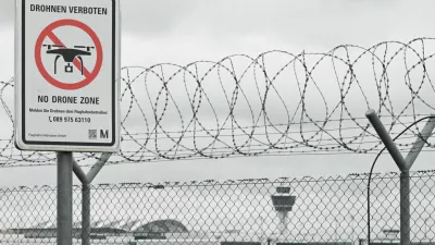 A sign with a drone ban is displayed outside the airport in Munich, Germany October 6, 2025. REUTERS/Angelika Warmuth