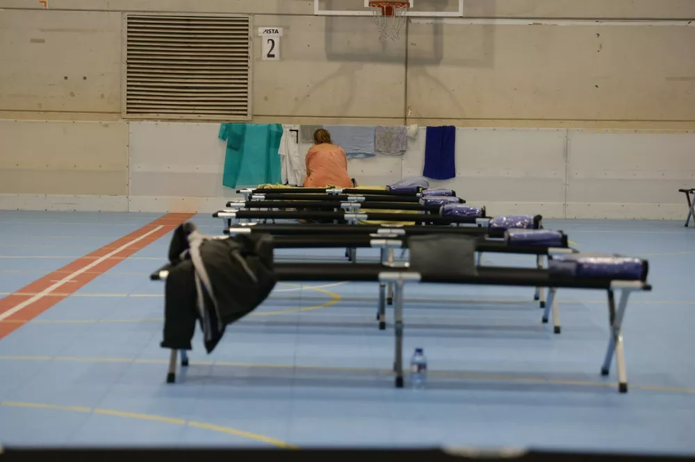 October 10, 2025, Cartagena (Region Of Murcia, Spain: Stretchers in the sports pavilion of the Cabezo Beaza industrial estate for people who have been evicted from their homes due to heavy rains, on October 10, 2025, in Cartagena, Region of Murcia (Spain). The City Council of Cartagena has ordered the eviction of people in Villas Caravaning, Bah&iacute;a Bella and La Algameca, due to the accumulation of water from rains and runoff in these areas of the municipality. Also, the eviction of Navantia workers is taking place, as the factory is located next to the Benipila wadi. In the pavilion there are fifty beds and staff of Civil Protection and Social Services to ensure the care of all persons requiring assistance...OCTOBER 10;2025..Mart&iacute;n C. / Europa Press..10/10/2025,Image: 1044553521, License: Rights-managed, Restrictions: * Spain Rights OUT *, Model Release: no