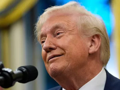 President Donald Trump speaks in the Oval Office of the White House, Friday, Oct. 10, 2025, in Washington. (AP Photo/Alex Brandon)