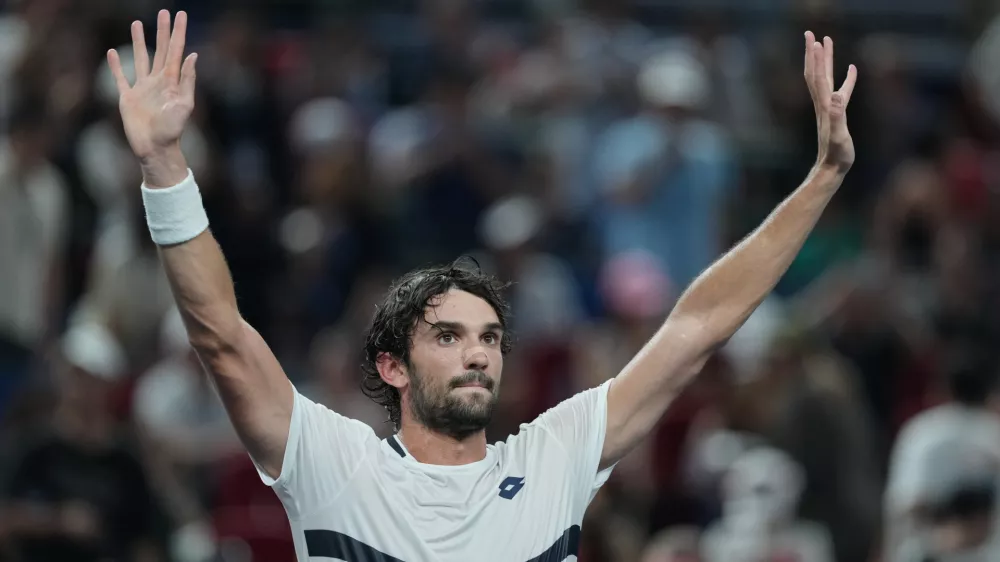 Valentin Vacherot of Monaco celebrates after defeating Novak Djokovic of Serbia in the men's singles semifinal match of the Shanghai Masters tennis tournament at Qizhong Forest Sports City Tennis Center, in Shanghai, China, Saturday, Oct. 11, 2025. (AP Photo/Andy Wong)