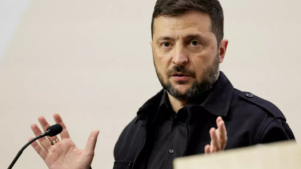 FILE PHOTO: Ukraine's President Volodymyr Zelenskiy speaks during a press conference with Denmark's Prime Minister Mette Frederiksen, on the day of the European Political Community summit in Copenhagen, Denmark, October 2, 2025. REUTERS/Leonhard Foeger/File Photo