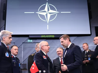 Turkish Defense Minister Yasar Guler, center left, speaks with Estonia's Defense Minister Hanno Pevkur, center right, during a meeting of the North Atlantic Council in defense ministers format at NATO headquarters in Brussels, Wednesday, Oct. 15, 2025 (AP Photo/Omar Havana)