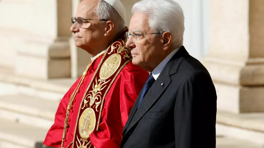 Italian President Sergio Mattarella welcomes Pope Leo XIV during an official visit at the Quirinale Palace in Rome, Italy, October 14, 2025. REUTERS/Remo Casilli