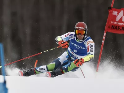 Slovenia's Zan Kranjec competes in an alpine ski, men's World Cup Giant Slalom, in Hafjell, Norway, Saturday, March 15, 2025. (AP Photo/Gabriele Facciotti)