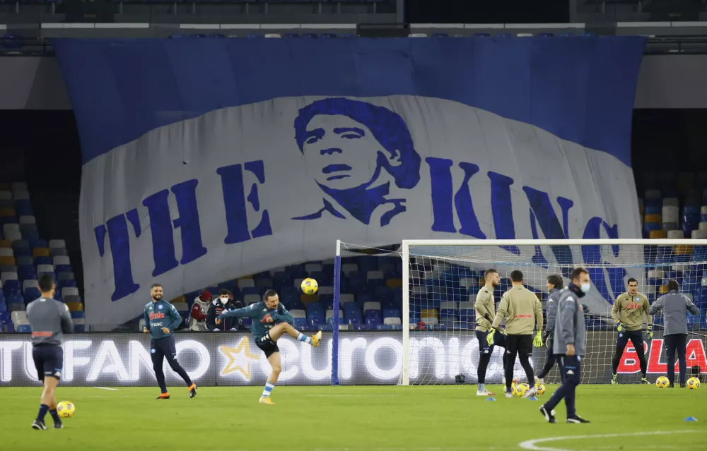 Soccer Football - Serie A - Napoli v AS Roma - Stadio San Paolo, Naples, Italy - November 29, 2020 A banner in memory of Diego Maradona is seen during the warm up before the match REUTERS/Ciro De Luca