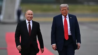 FILED - 15 August 2025, US, Alaska: US President Donald Trump walks on a red carpet alongside Russia's President Vladimir Putin ahead of their meeting in Alaska. Photo: Sergey Bobylev/Kremlin/dpa - ATTENTION: editorial use only and only if the credit mentioned above is referenced in full