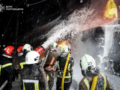 Firefighters work at the site where an energy infrastructure enterprise was hit during overnight Russian missile and drone strikes, amid Russia's attack on Ukraine, in Poltava region, Ukraine October 16, 2025. Press service of the State Emergency Service of Ukraine in Poltava region/Handout via REUTERS ATTENTION EDITORS - THIS IMAGE HAS BEEN SUPPLIED BY A THIRD PARTY. DO NOT OBSCURE LOGO.