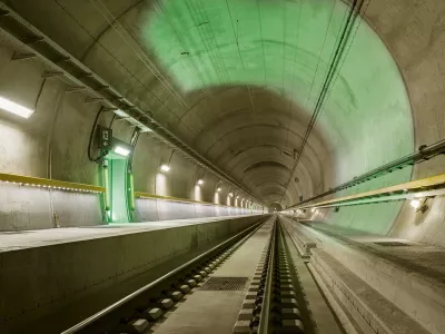 In this image released on Monday, Apr. 4, 2016, the tracks of the Gotthard Base Tunnel point to the future of the trans-Alpine railway. The Gotthard Base Tunnel, the longest train tunnel in the world, enters into service on 11 December 2016. Prior to this, the record-breaking construction will be more accessible than ever, but only for a limited period. From 2 August 2016, passengers may descend into the once-in-a-century construction on exclusive tunnel rides - disembarkation in the depths of the mountain included. The special Gottardino train only runs until 27 November 2016 and the number of tickets is limited. For more information visit www.apassignments.com/newsaktuell. (Swiss Travel System AG/obs via AP Images)
