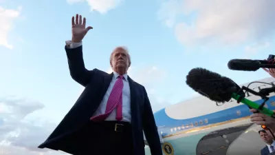 President Donald Trump waves after arrives on Air Force One, Friday, Oct. 17, 2025, at Palm Beach International Airport in West Palm Beach, Fla. (AP Photo/Mark Schiefelbein)
