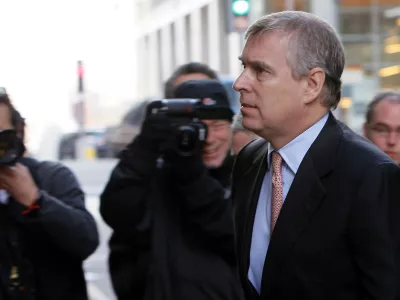 FILE - Britain's Prince Andrew arrives in Canary Wharf, London, to visit the headquarters of the London CrossRail project in London, March, 7, 2011. (AP Photo/Alastair Grant, File)