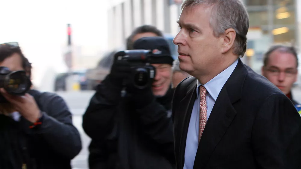 FILE - Britain's Prince Andrew arrives in Canary Wharf, London, to visit the headquarters of the London CrossRail project in London, March, 7, 2011. (AP Photo/Alastair Grant, File)