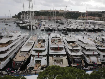 Yachts are showing at the 24th edition of the Monaco Yacht Show, Wednesday, Sept. 25, 2013, in Monaco.The Monaco Yacht Show, taking place at Port Hercules in Monaco, is the only boat show devoted exclusively to luxury yachting. (AP Photo/Lionel Cironneau)