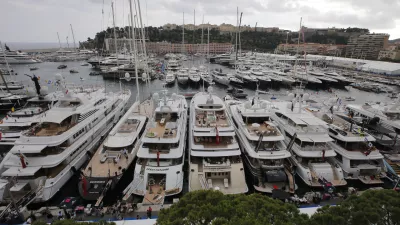 Yachts are showing at the 24th edition of the Monaco Yacht Show, Wednesday, Sept. 25, 2013, in Monaco.The Monaco Yacht Show, taking place at Port Hercules in Monaco, is the only boat show devoted exclusively to luxury yachting. (AP Photo/Lionel Cironneau)