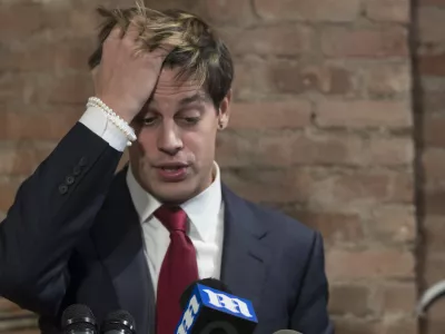 Milo Yiannopoulos speaks during a news conference, Tuesday, Feb. 21, 2017, in New York. Yiannopoulos has resigned as editor of Breitbart Tech after coming under fire from other conservatives over comments on sexual relationships between boys and older men. (AP Photo/Mary Altaffer)