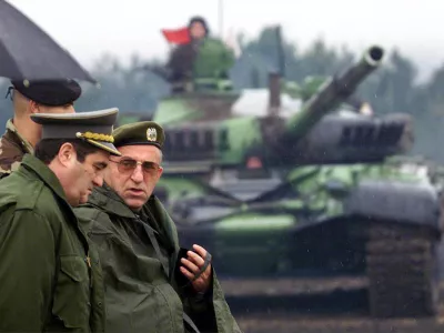 Former Yugoslav army chief of staff General Nebojsa Pavkovic, left, and General Vladimir Lazarevic, right, are seen in this Sept. 1, 2000 photo. The Yugoslav war crimes tribunal on Monday Oct. 20 2003 indicted four Serbian army and police generals for alleged atrocities against ethnic Albanians in Kosovo, including Pavkovic and Lazarevic. (AP Photo/Darko Vojinovic)