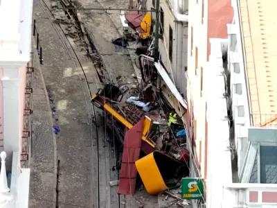 FILE PHOTO: A drone view shows the site of the accident after Gloria Funicular railway car, a popular tourist attraction, derailed and crashed, resulting in multiple casualties, according to authorities, in Lisbon, Portugal, September 4, 2025. REUTERS TV/via REUTERS. PORTUGAL OUT. NO COMMERCIAL OR EDITORIAL SALES IN PORTUGAL/File Photo