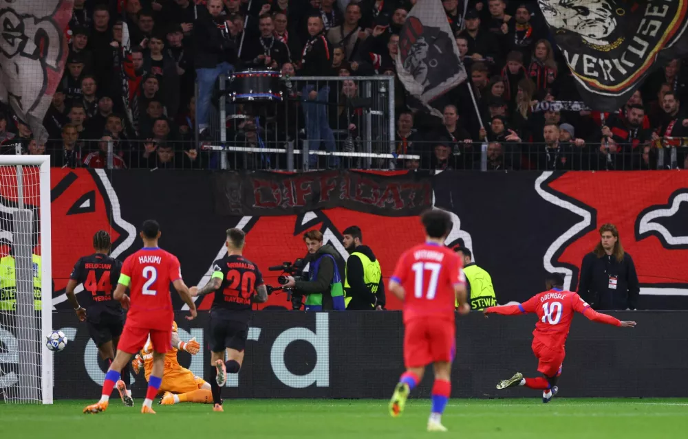 Soccer Football - UEFA Champions League - Bayer Leverkusen v Paris St Germain - BayArena, Leverkusen, Germany - October 21, 2025 Paris St Germain's Ousmane Dembele scores their sixth goal REUTERS/Thilo Schmuelgen