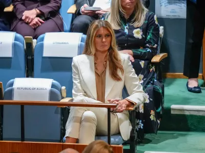 First Lady Melania Trump listens as President Donald Trump speaks during the 80th session of the United Nations General Assembly, Tuesday, Sept. 23, 2025, at U.N. headquarters. (AP Photo/Yuki Iwamura)