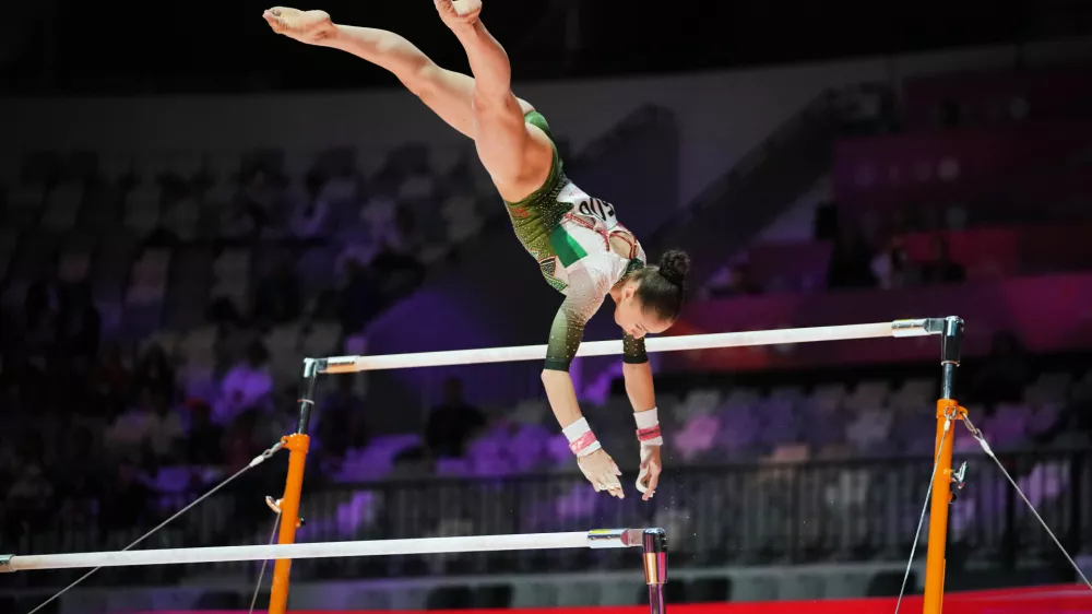 Kaylia Nemour of Algeria competes in the women's uneven bars final during the 53rd Artistic Gymnastics World Championships in Jakarta, Indonesia, Friday, Oct. 24, 2025. (AP Photo/Achmad Ibrahim)