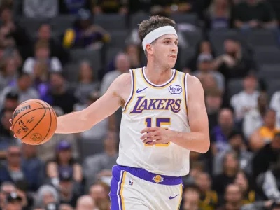 Oct 26, 2025; Sacramento, California, USA; Los Angeles Lakers guard Austin Reaves (15) controls the ball against the Sacramento Kings during the second quarter at Golden 1 Center. Mandatory Credit: Ed Szczepanski-Imagn Images