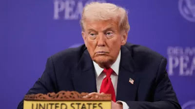 President Donald Trump reacts during a signing ceremony on the sidelines of the ASEAN Summit in Kuala Lumpur, Malaysia, Sunday, Oct. 26, 2025. (AP Photo/Mark Schiefelbein)