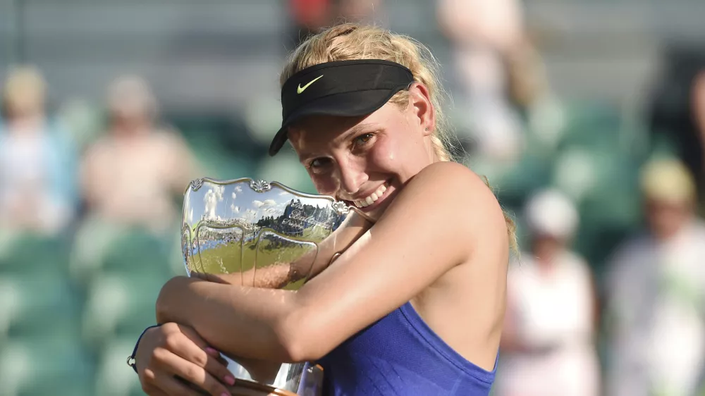Croatia's Donna Vekic celebrates winning the women's finall on day seven of the Nottingham Open at Nottingham Tennis Centre, England, Sunday June 18, 2017. (Joe Giddens/PA via AP)