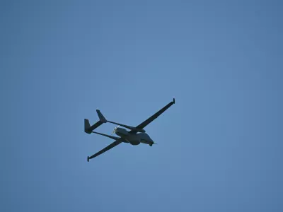 The IAI Heron drone manufactured in Israel, flies during the annual military parade to mark Ochi Day, commemorating Greece's defiance of Fascist Italy that forced it to enter World War II., in Thessaloniki, northern Greece, Tuesday, Oct. 28, 2025. (AP Photo/Giannis Papanikos)