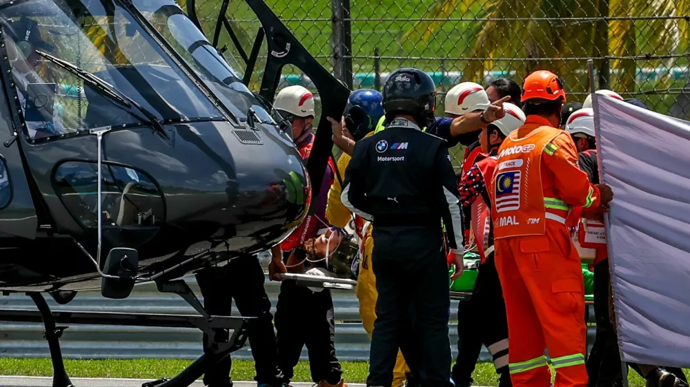 SEPANG, SGR - OCTOBER 26: Noah Dettwiler of Switzerland and CIP Green Power is taken by helicopter to hospital after a crash with Jose Antonio Rueda of Spain and Red Bull KTM Ajo during sighting lap ahead Moto3 race of the Petronas Grand Prix of Malaysia on October 26, 2025 held at Sepang International Circuit in Sepang, Malaysia.(Photo by Hazrin Yeob Men Shah/Icon Sportswire) (Icon Sportswire via AP Images)
