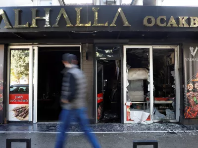 A man looks as he walks past a demolished Turkish owned restaurant in downtown, after a man was stabbed and wounded in a late-night incident in Podgorica, Montenegro, October 27, 2025. REUTERS/Stevo Vasiljevic