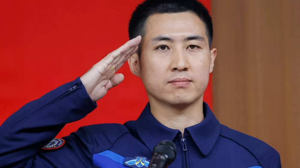 Astronaut Wu Fei salutes during a press conference before the Shenzhou-21&nbsp;spaceflight mission to&nbsp;China's Tiangong&nbsp;space&nbsp;station, at&nbsp;Jiuquan&nbsp;Satellite&nbsp;Launch&nbsp;Center, near&nbsp;Jiuquan, Gansu province,&nbsp;China, October 30, 2025. REUTERS/Maxim Shemetov